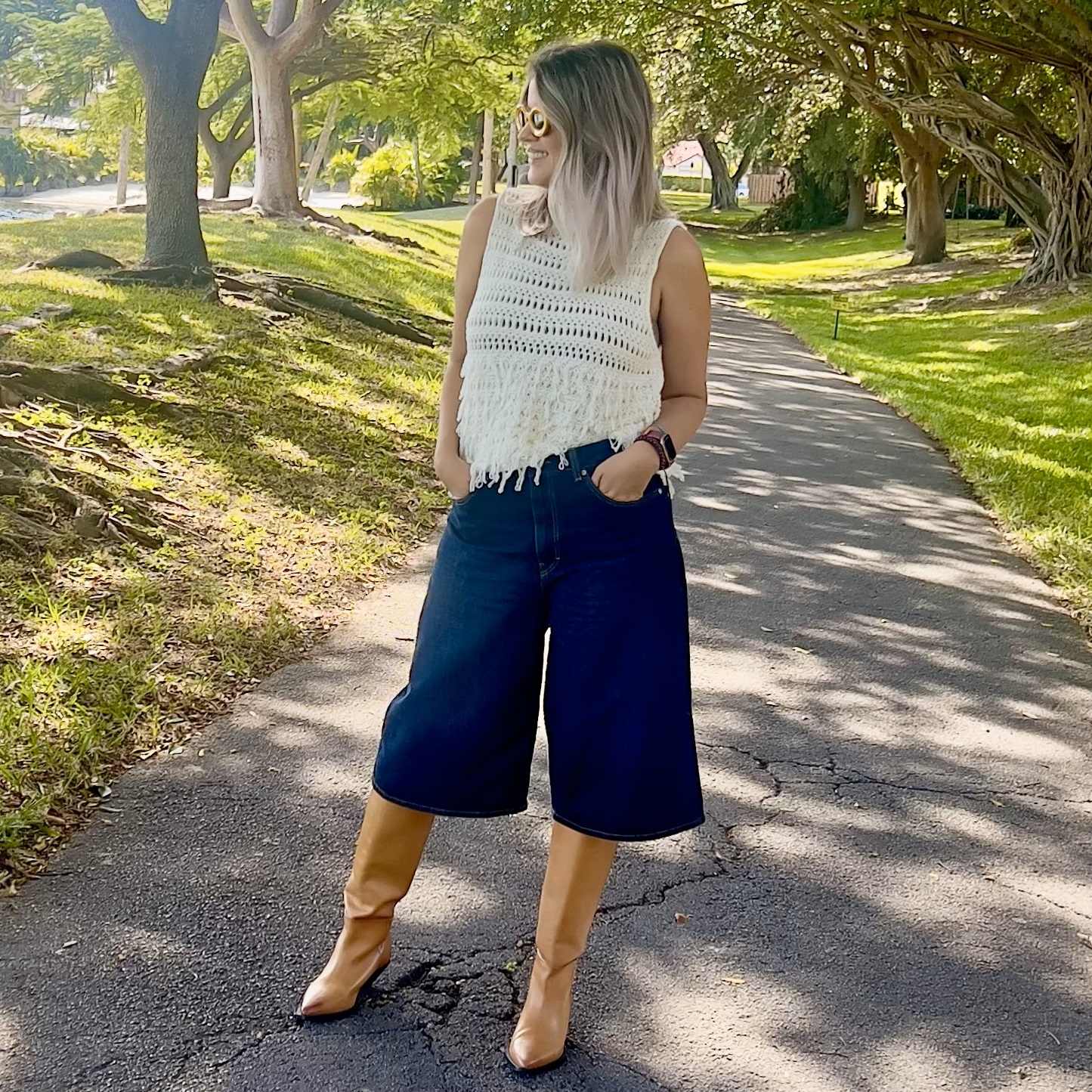 Photo of Laura wearing a Women's Chic Tassel Sweater Vest