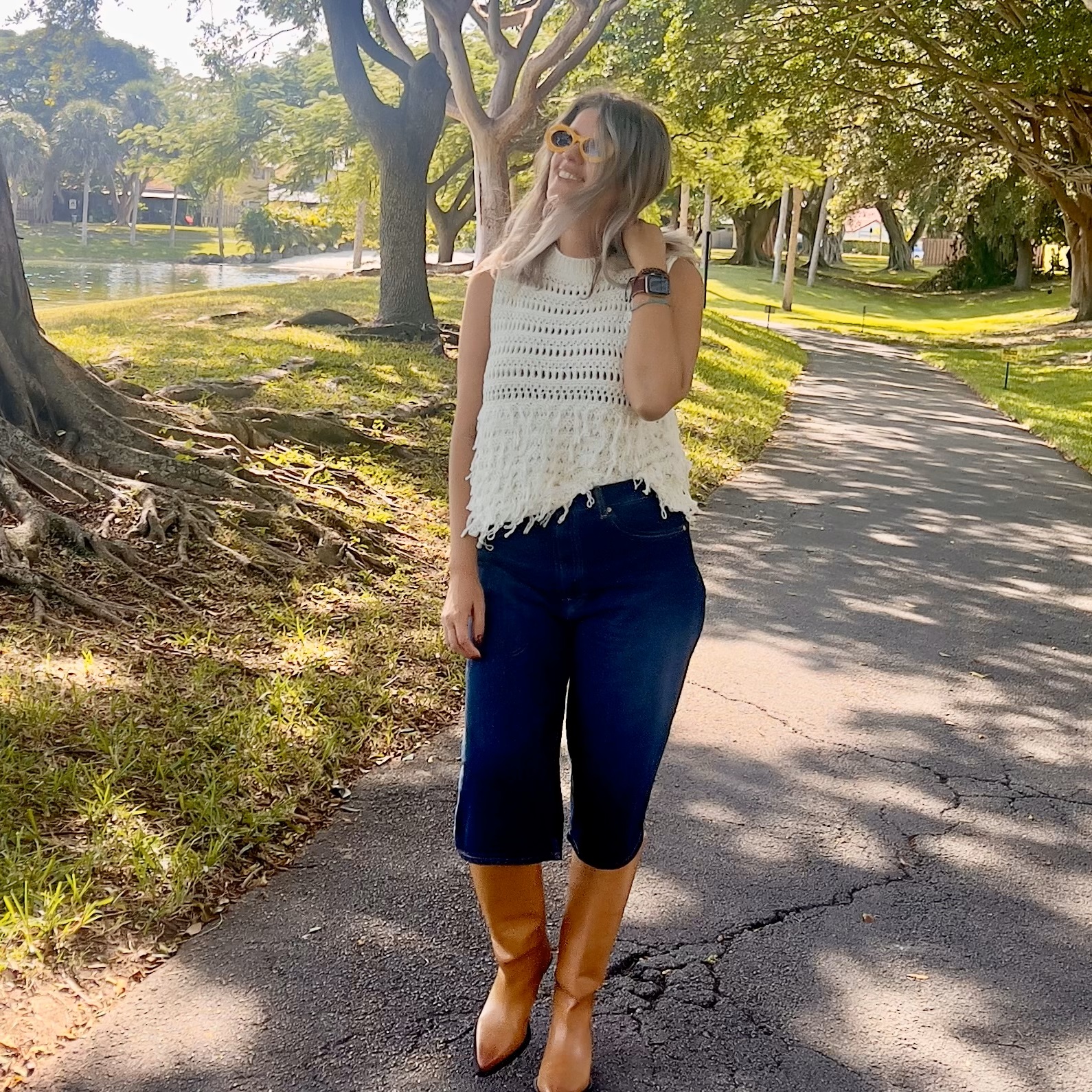 Photo of Laura wearing a Women's Chic Tassel Sweater Vest