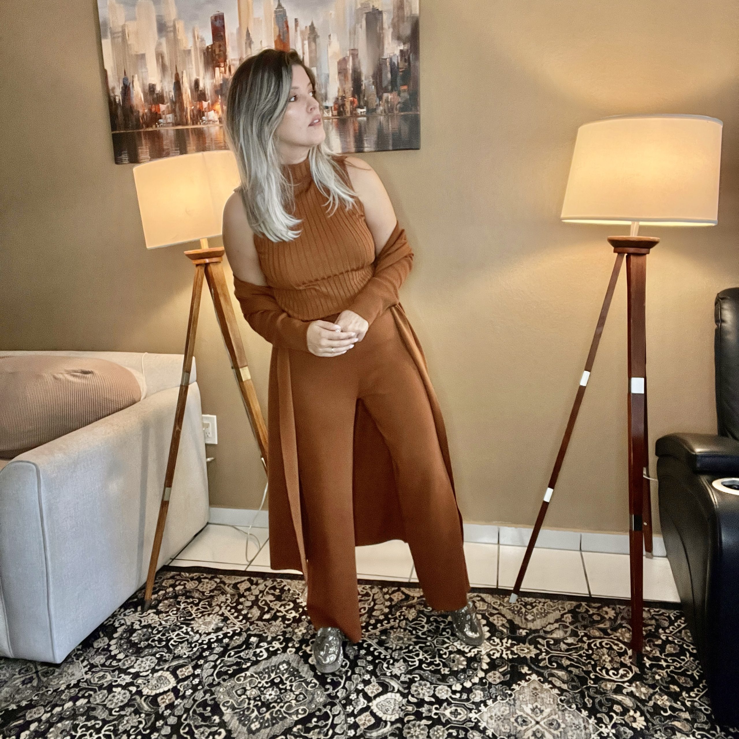 Portrait of Laura wearing a Women's 3 Piece Knitted Cardigan Tracksuit Set.