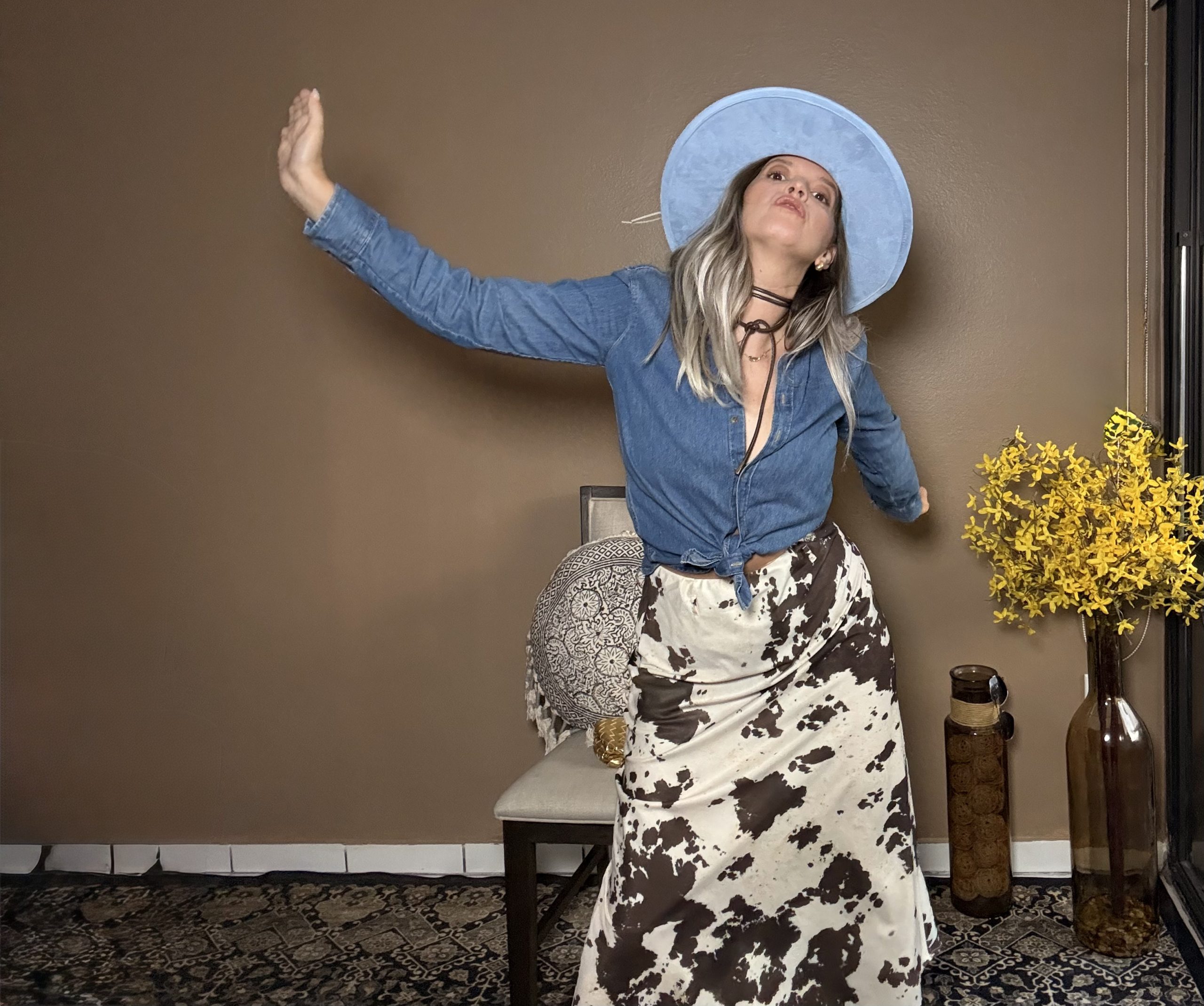 Portrait of Laura wearing a Elegant Y2k Long Sleeve Top & Midi Skirt Set.