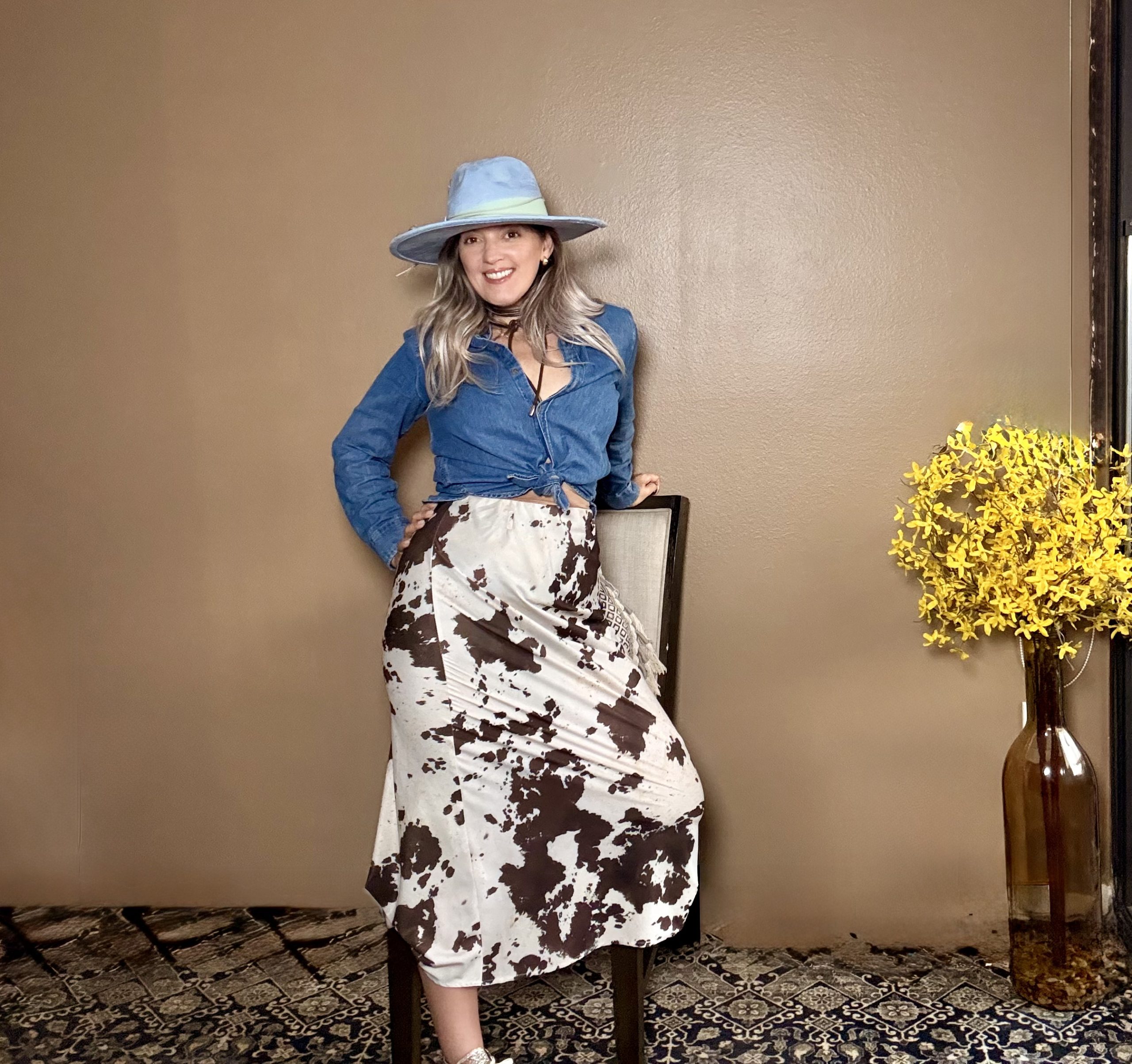 Portrait of Laura wearing a Elegant Y2k Long Sleeve Top & Midi Skirt Set.